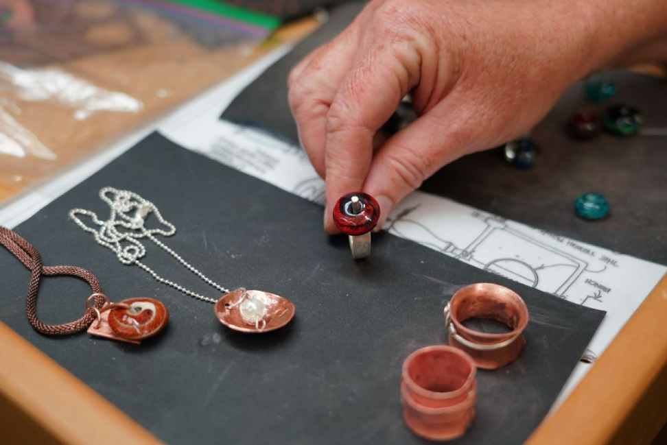 What materials are typically used in traditional jewelry making?